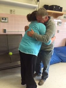 Chelsea and her father hug good-bye at Tewksbury State Hospital.